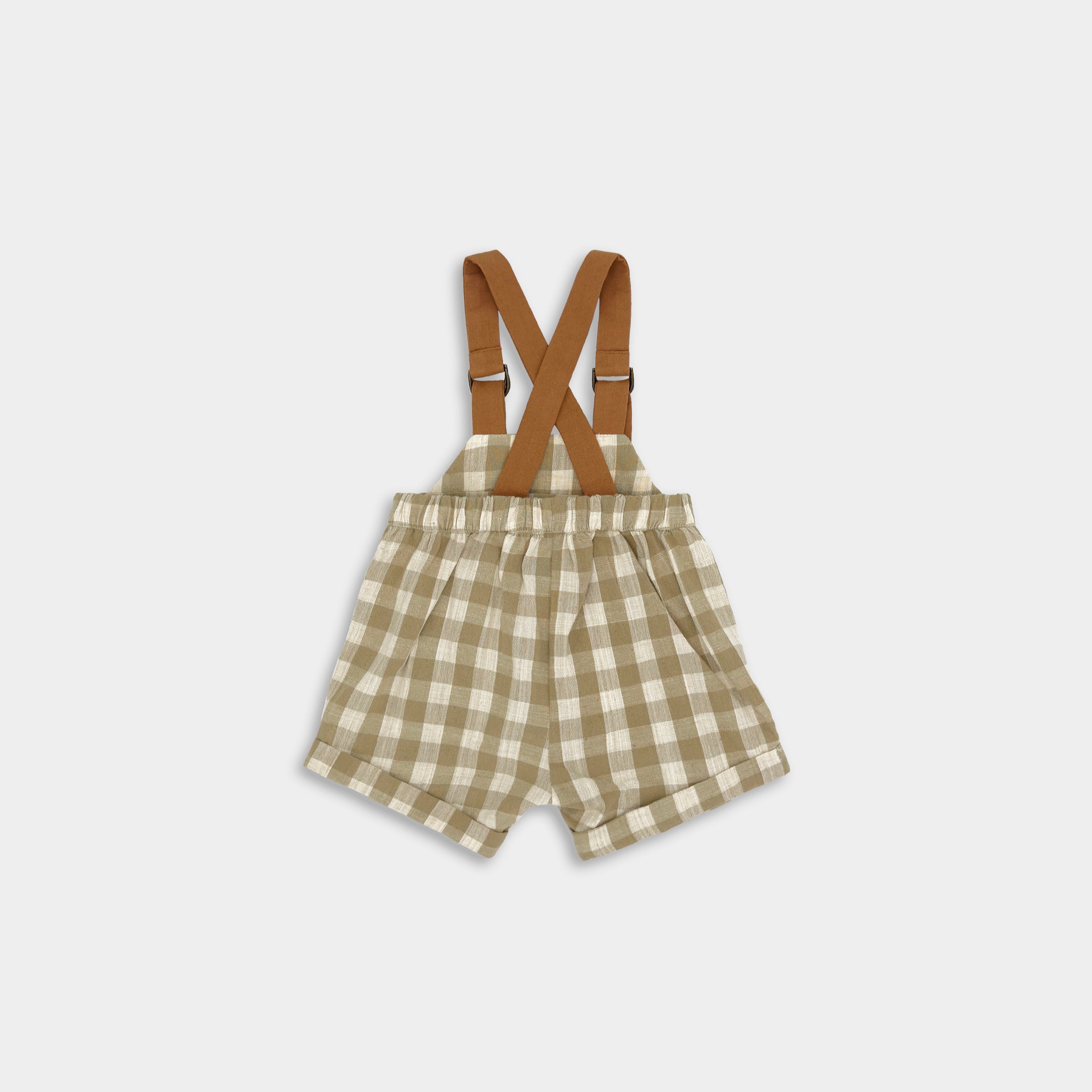 Back view of Unisex Grow-With-Me Romper in Beige Gingham for boys and girls, featuring fully adjustable brown straps for a customizable fit as your child grows, stylish leather-looking straps for added durability, a timeless gingham pattern perfect for any occasion, and soft, breathable fabric ensuring all-day comfort.