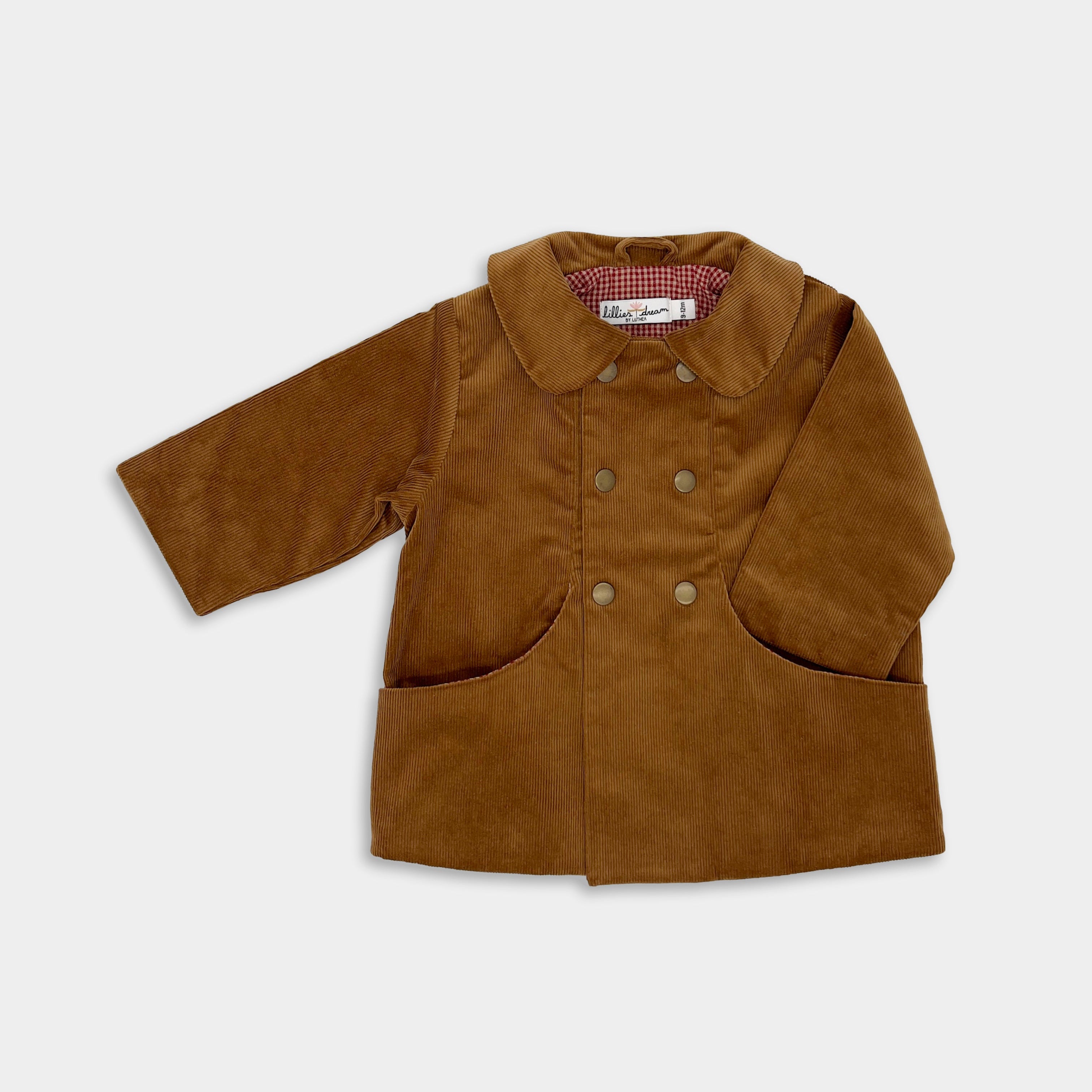 Front View of Camel Coat: A front view of the Camel coat showcases its classic Peter Pan collar and large front pockets, highlighting its vintage-inspired design and stylish appeal.