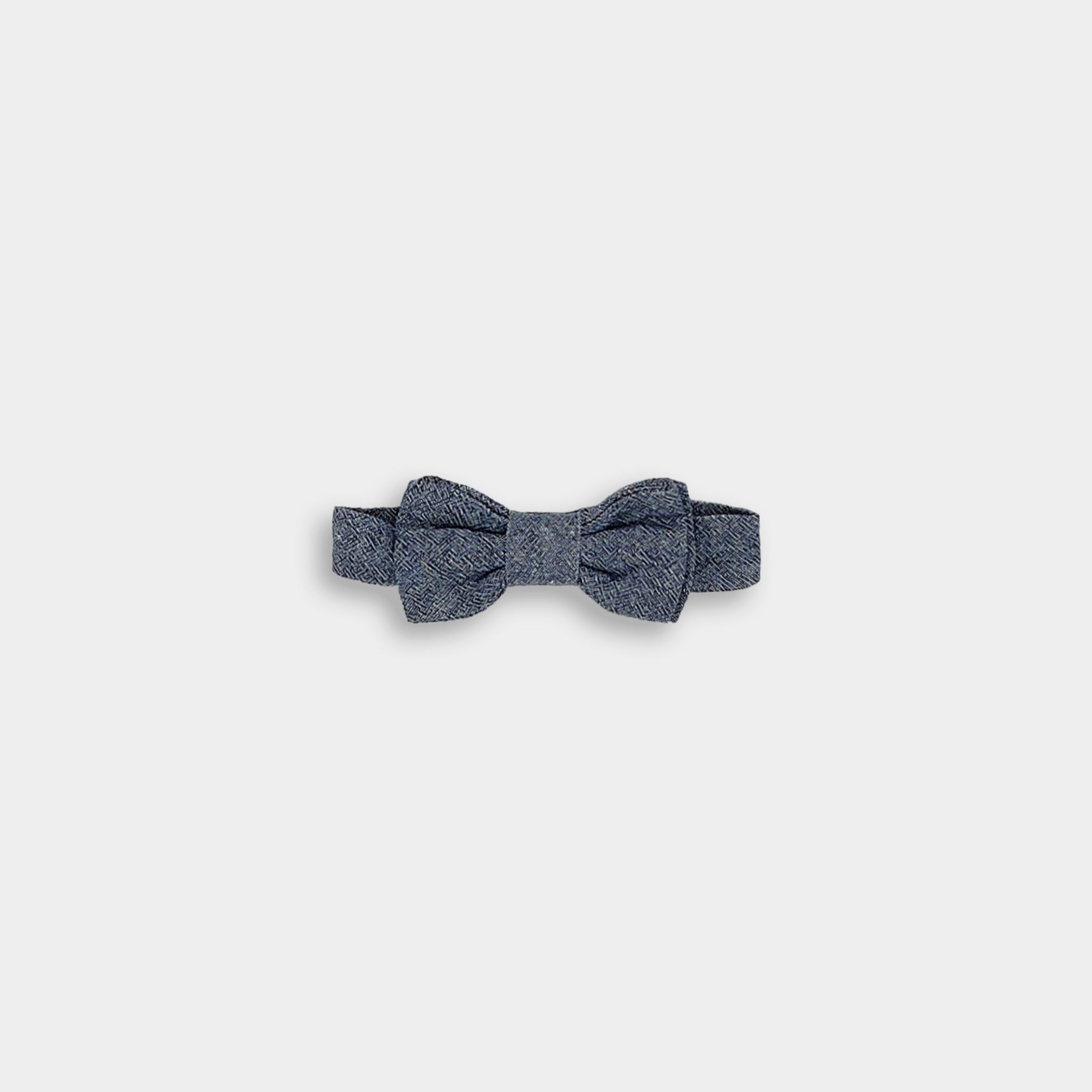 Product Image of Chambray Blue Bow Tie: A detailed view of the Chambray Blue bow tie, highlighting its classic design and versatile style, perfect for enhancing any outfit for young boys.