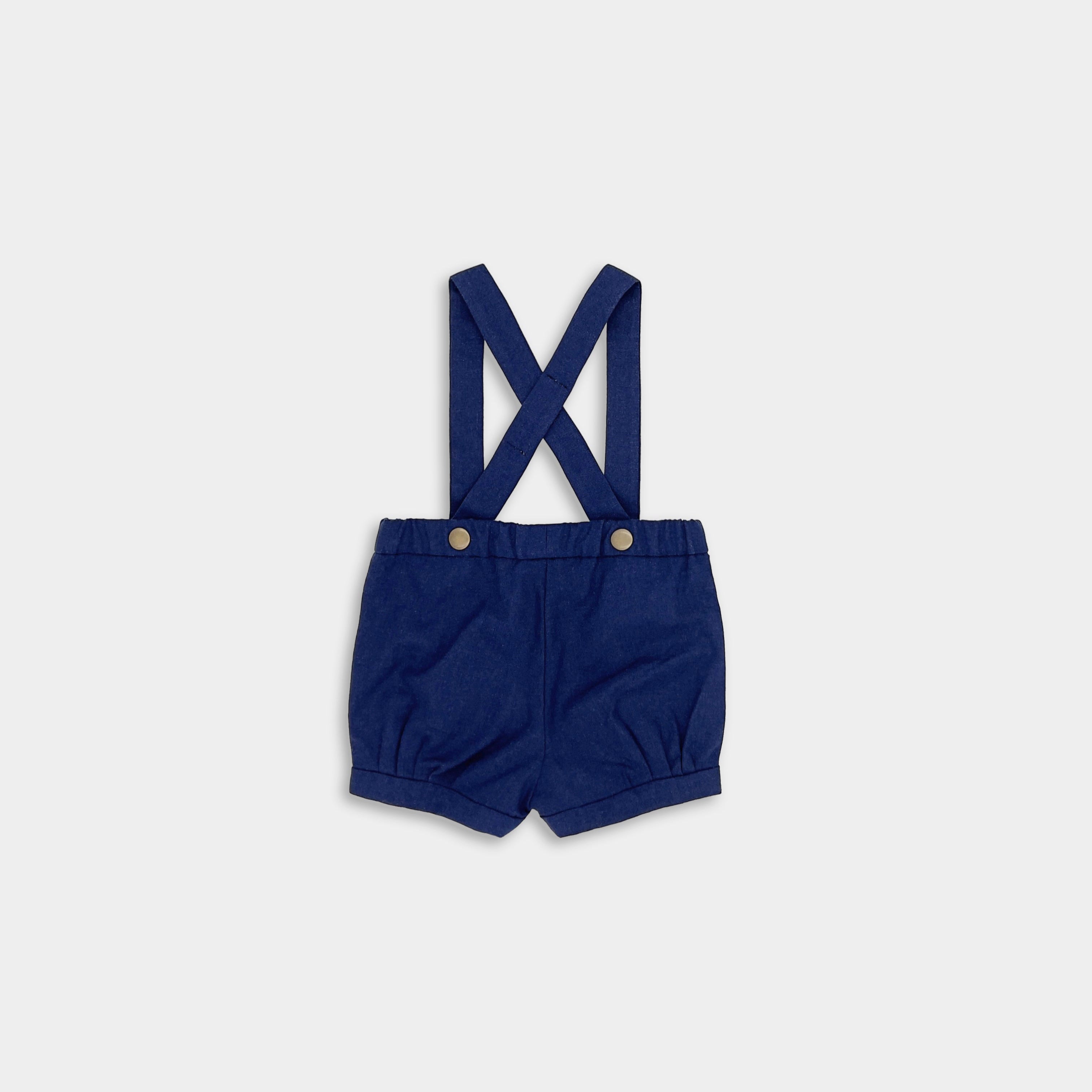 Navy suspender shorts seen from the back