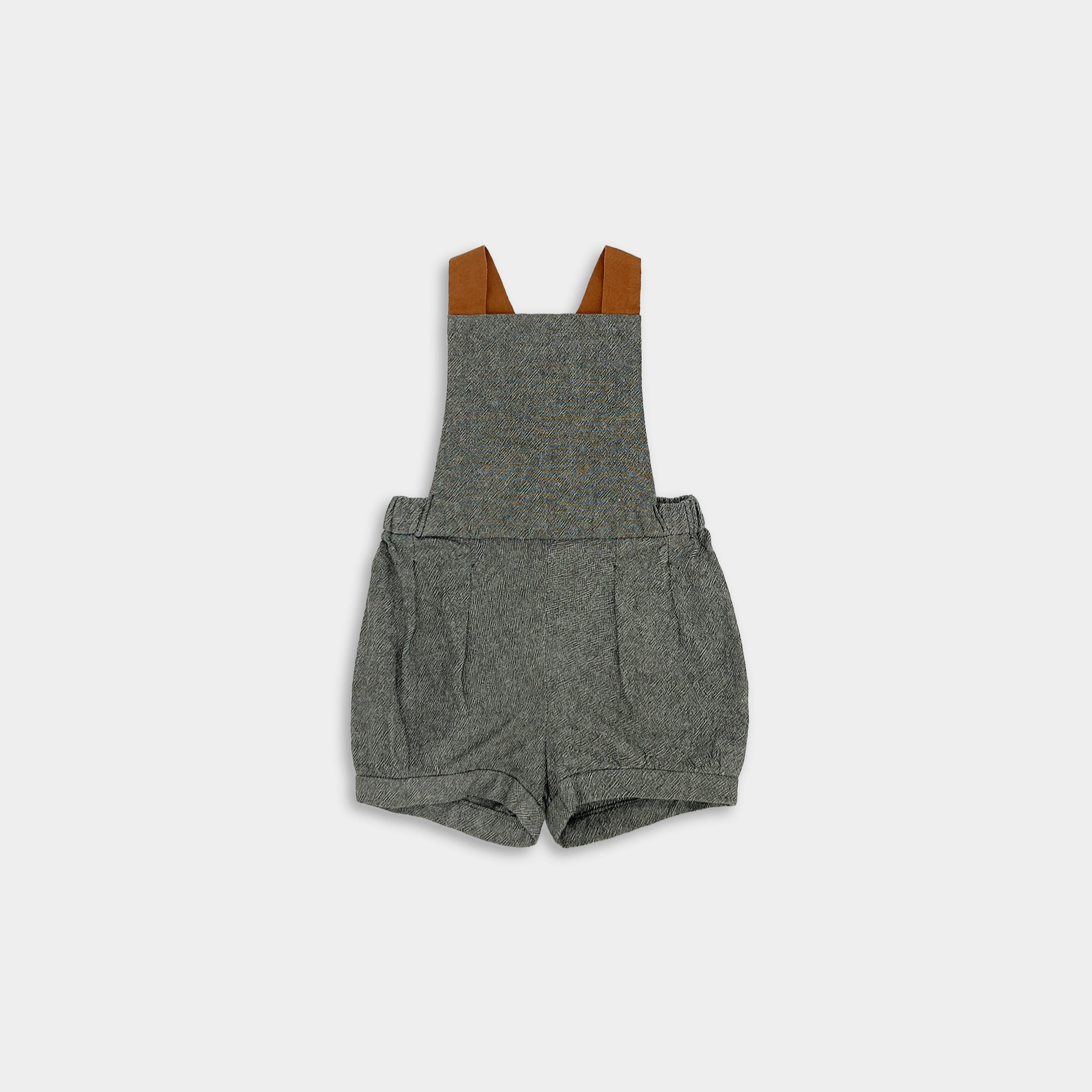 Front view of green short overalls
