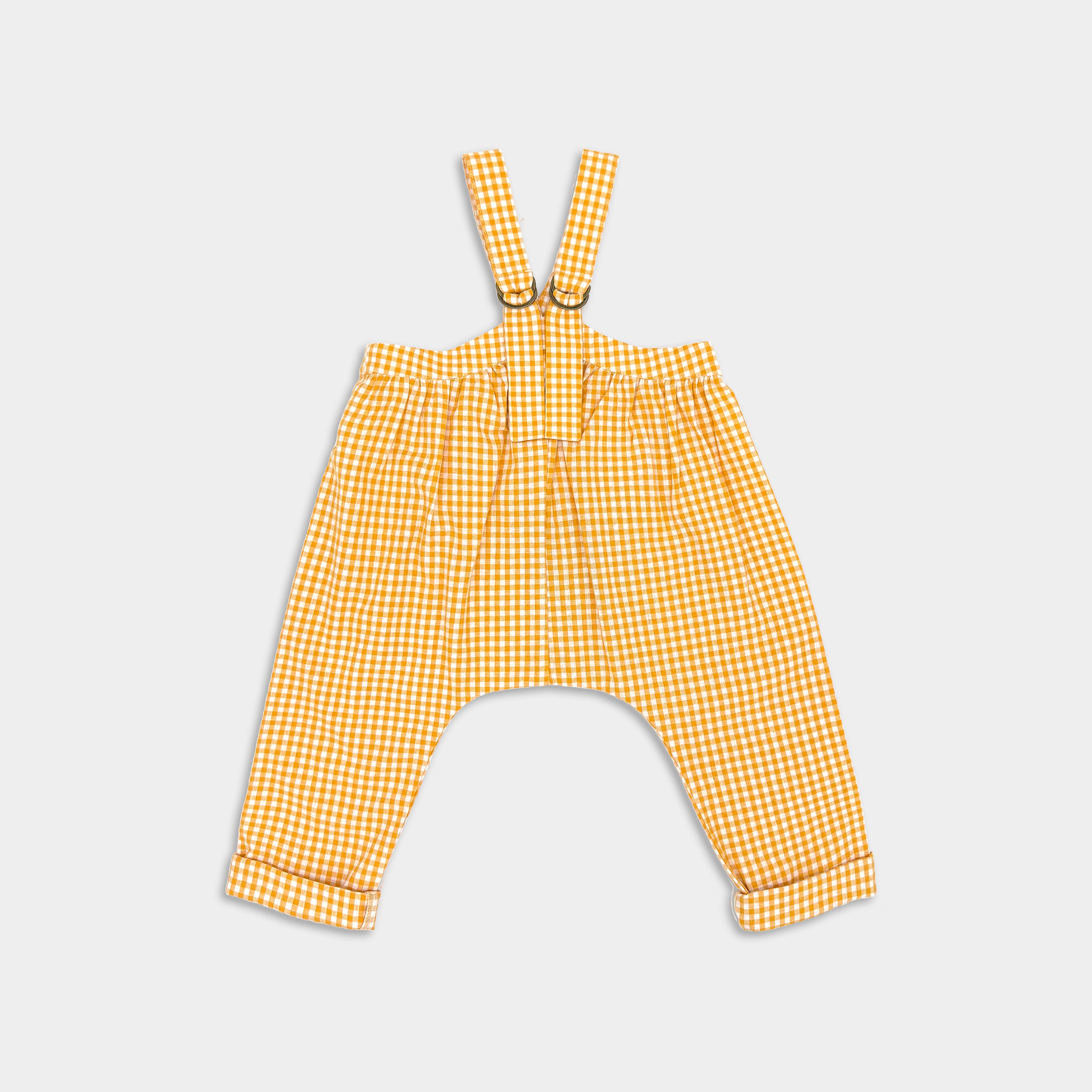 back of yellow gingham suspender pants