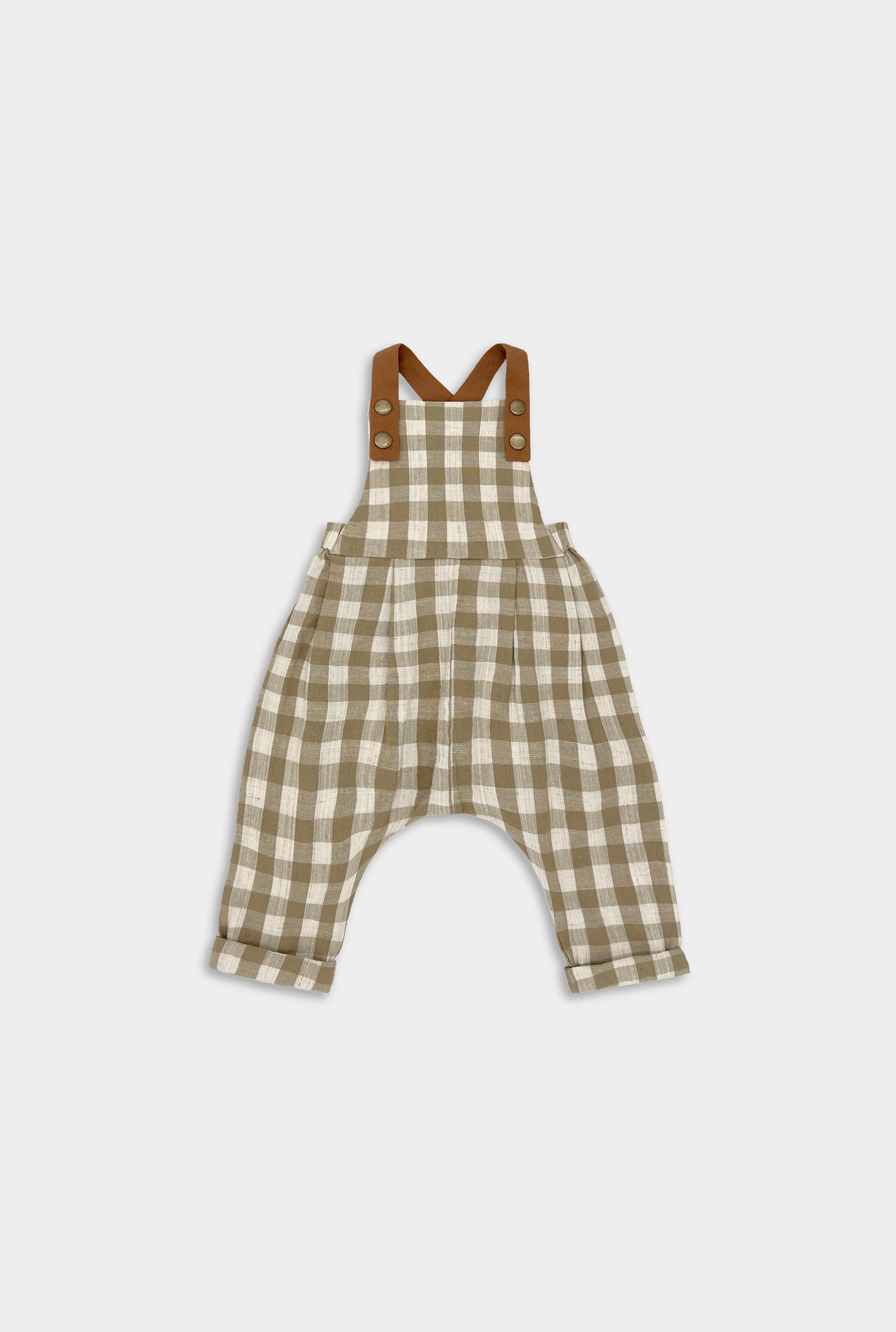 Front view of Beige Gingham linen long overalls for children, featuring gender-neutral design, breathable fabric for all-day comfort, stylish pleats for elegance, durable leather-looking straps, adjustable straps for a perfect fit, and unfoldable leg cuffs that allow for growth.
