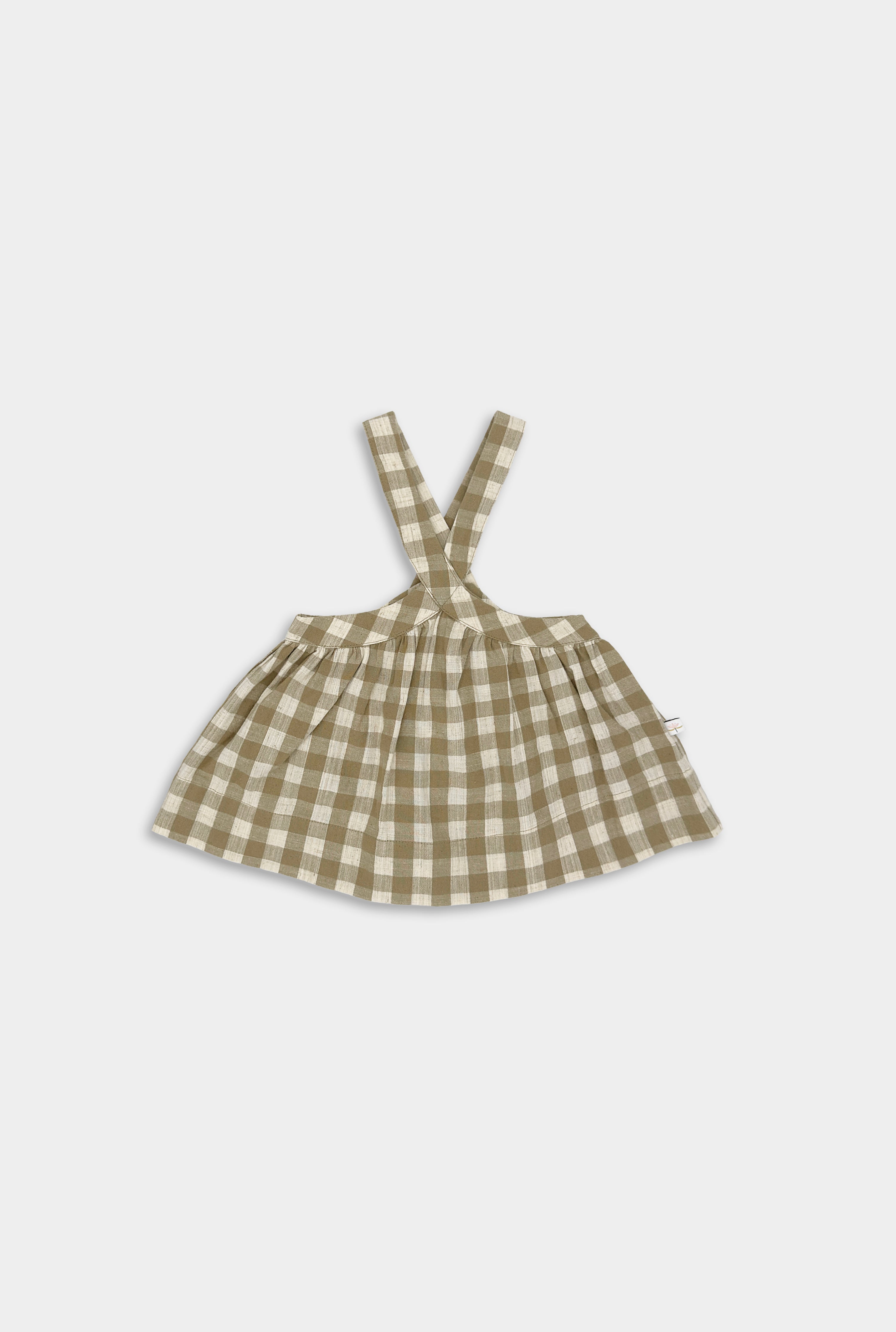 Front view of Beige Gingham Pinafore made from high-quality linen, featuring a unique design with adjustable high-waist straps for a cute vintage-inspired fit, built to last with an extra 2" of hem allowance for growth, V-shaped straps to keep them securely on the shoulders, and adjustable straps available in three lengths for layering and continued growth.