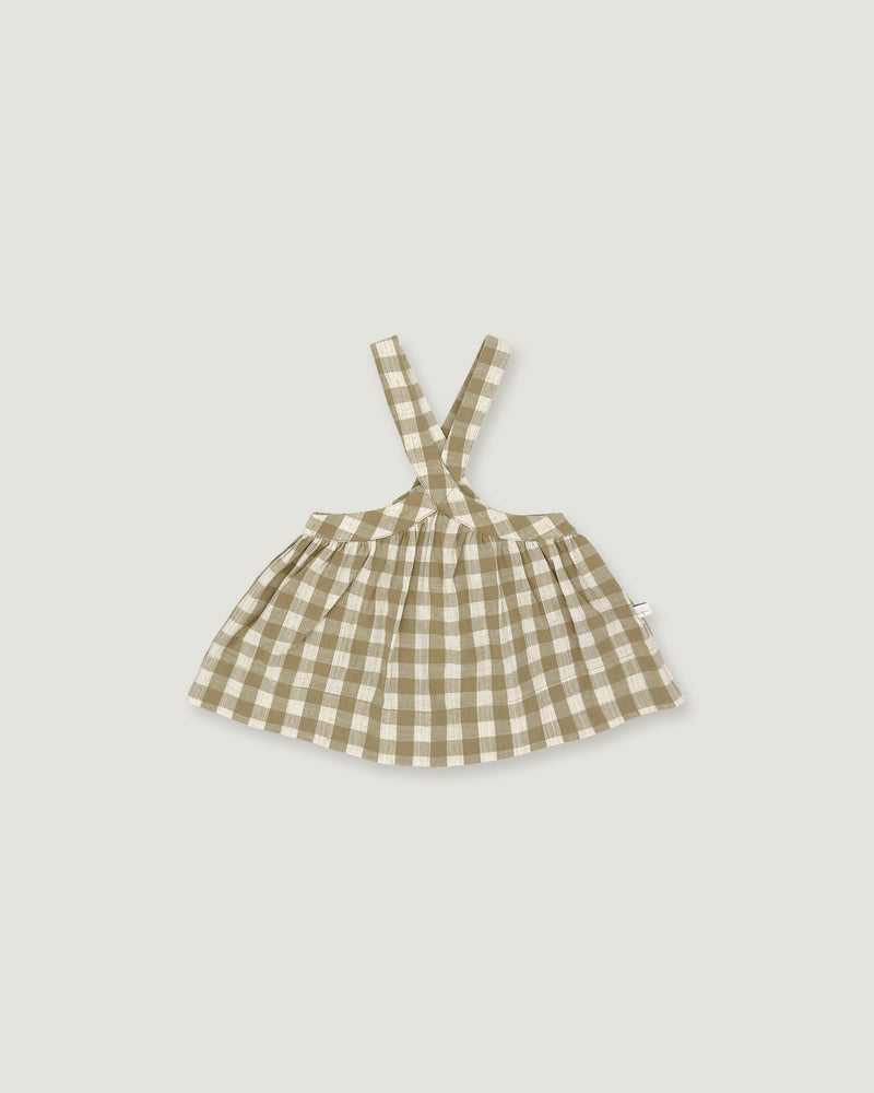 A small sleeveless dress with shoulder straps in a beige and white gingham check pattern, shown flat against a light gray background.