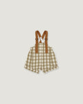 A baby romper with brown suspenders, featuring a beige and white gingham check pattern, shown flat on a light gray background.