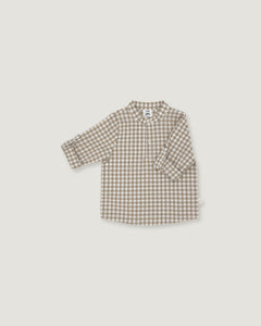 A long-sleeve children's button-up shirt with a brown and beige gingham check pattern, displayed flat against a light gray background.