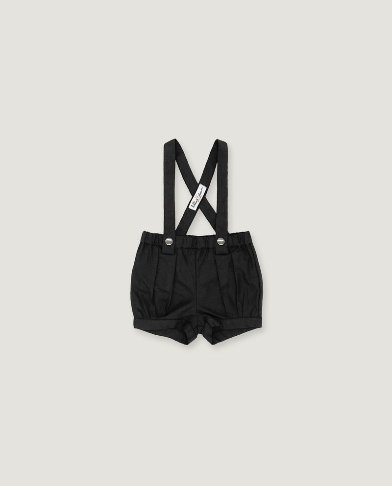Black baby boy's suspenders shorts with adjustable shoulder straps and a white brand tag, shown flat on a light gray background.