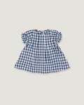 A toddler girl's short-sleeve dress in a classic blue and white gingham check pattern, featuring ruffled sleeves and a gathered skirt, shown flat on a light gray background.