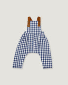 A baby romper in a blue and white gingham pattern with brown shoulder straps, displayed flat against a light gray background.