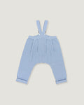A pair of children's blue and white gingham suspenders with a high waist and wide legs, laid flat on a light beige background.