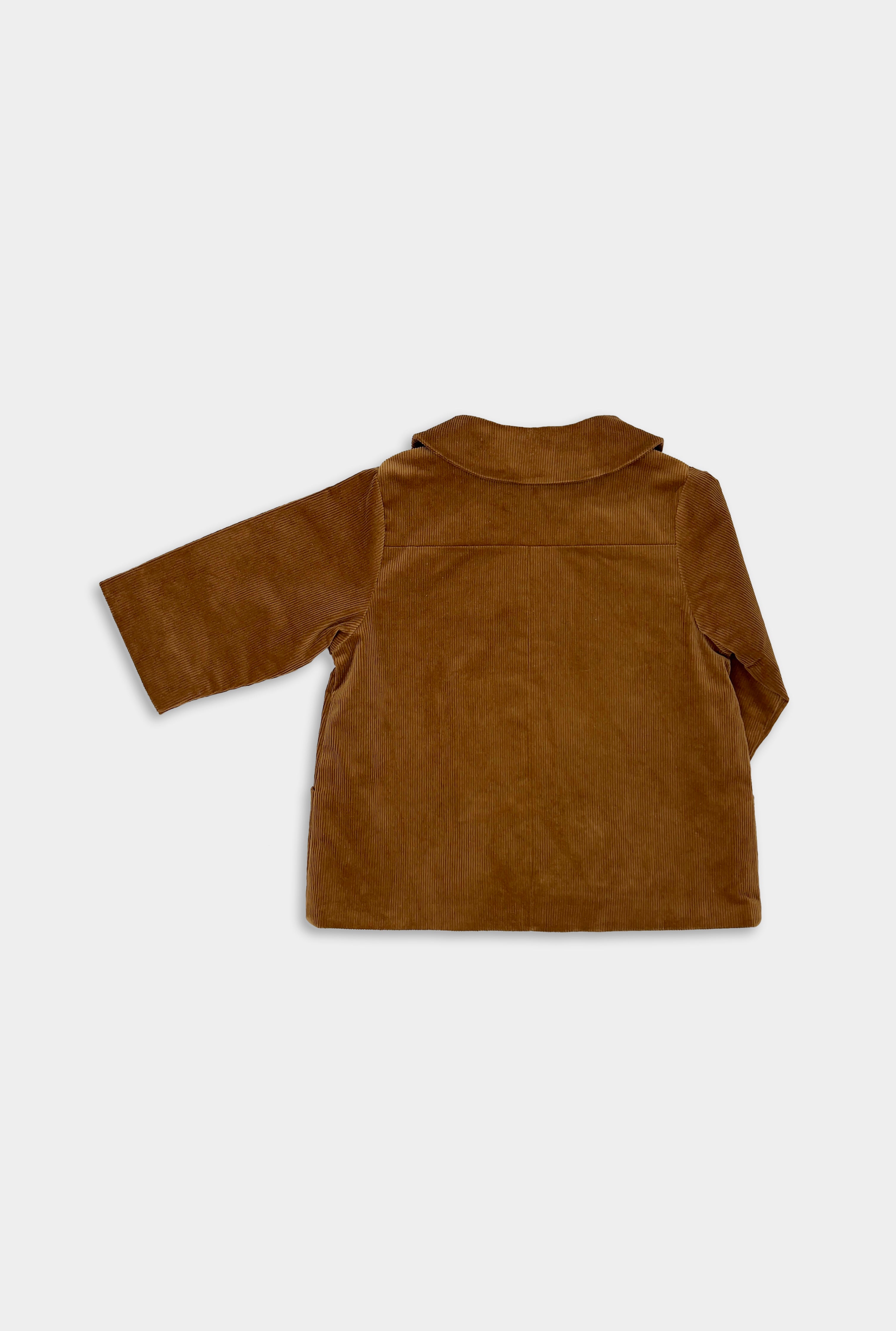 Back View of Camel Coat: The back view of the Camel coat emphasizes its durable construction and timeless design, perfect for everyday adventures.
