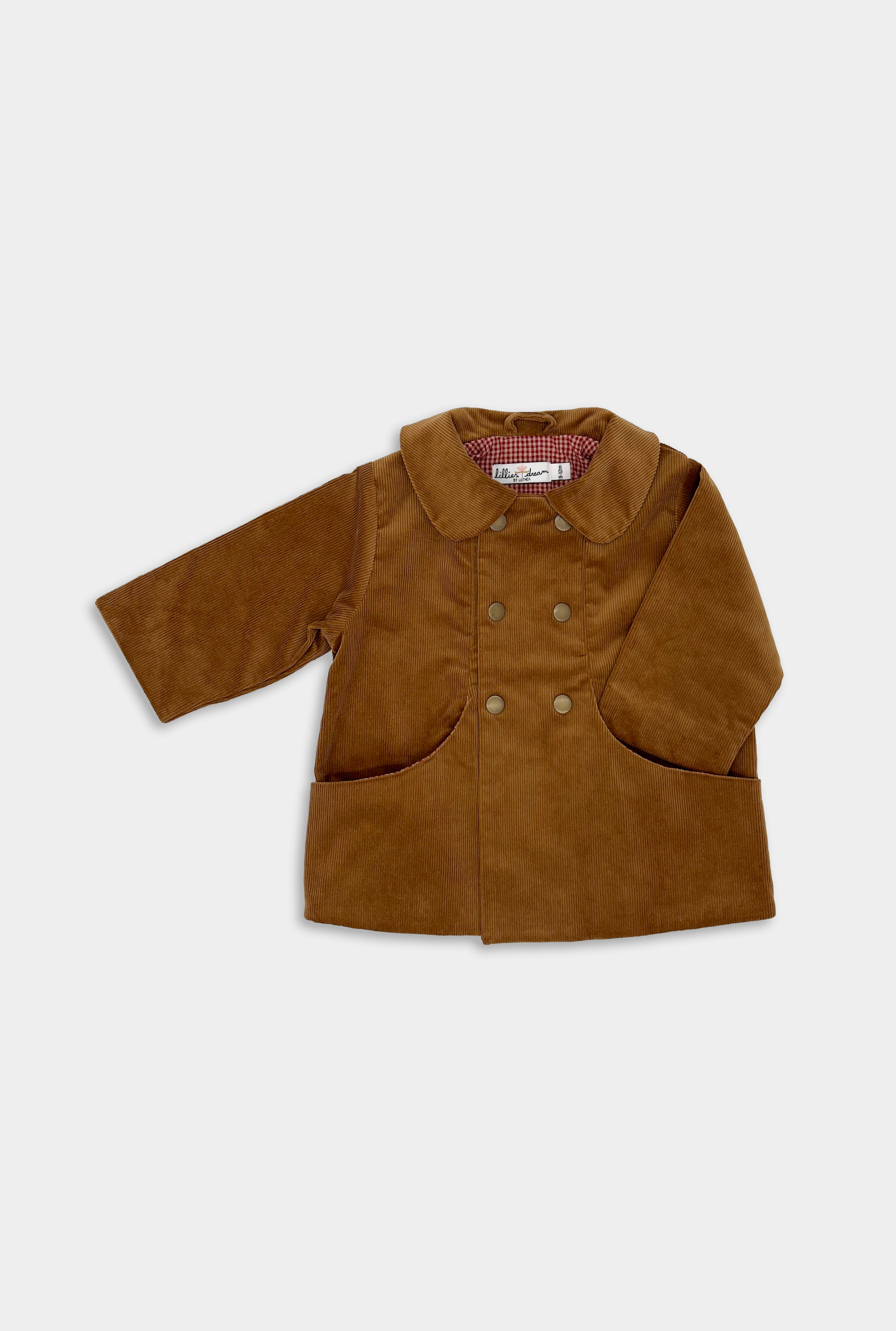 Front View of Camel Coat: A front view of the Camel coat showcases its classic Peter Pan collar and large front pockets, highlighting its vintage-inspired design and stylish appeal.