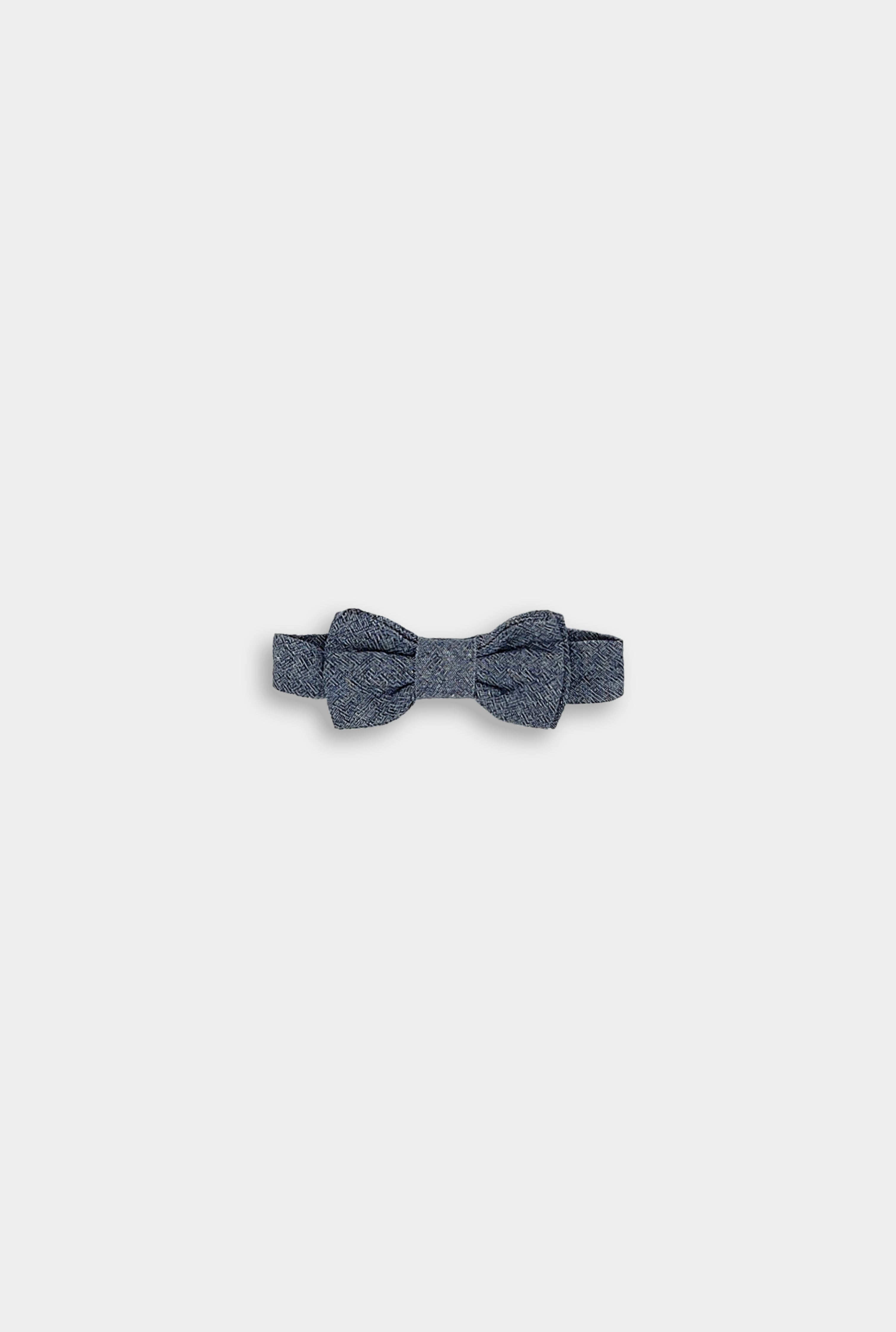 Product Image of Chambray Blue Bow Tie: A detailed view of the Chambray Blue bow tie, highlighting its classic design and versatile style, perfect for enhancing any outfit for young boys.