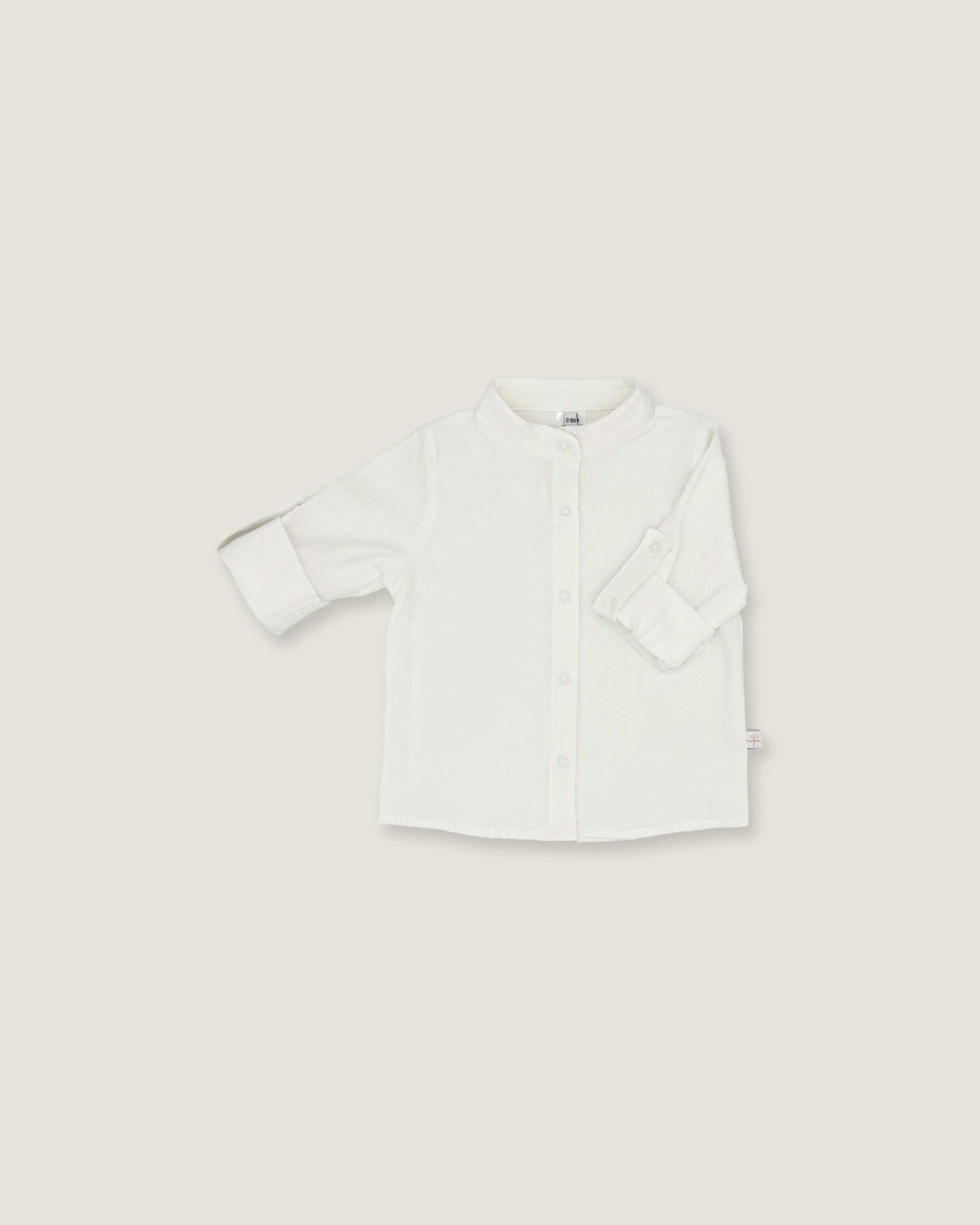 A white long-sleeve button-up shirt with a mandarin collar, displayed flat against a light gray background.