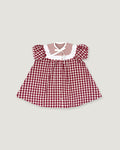 A toddler girl's dress featuring a red and white gingham pattern, a white ruffled collar with a striped inner lining, and puffed sleeves, shown flat on a light gray background.