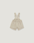 A pair of baby boy's cream-colored corduroy shorts with adjustable suspenders, laid flat against a light gray background.
