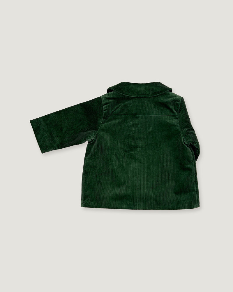 A dark forest green velvet jacket with long sleeves and a high collar, shown from the back against a light gray background.