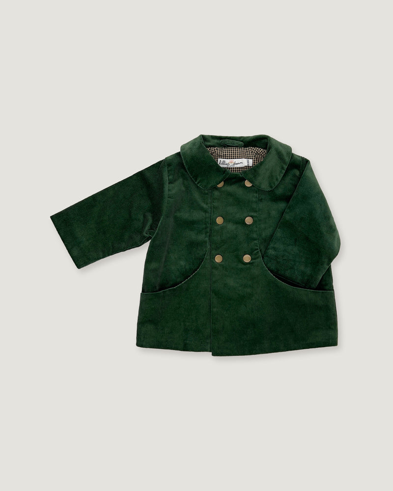 A dark green velvet jacket for toddlers, featuring a double-breasted design with gold buttons and front patch pockets, displayed on a light gray background.