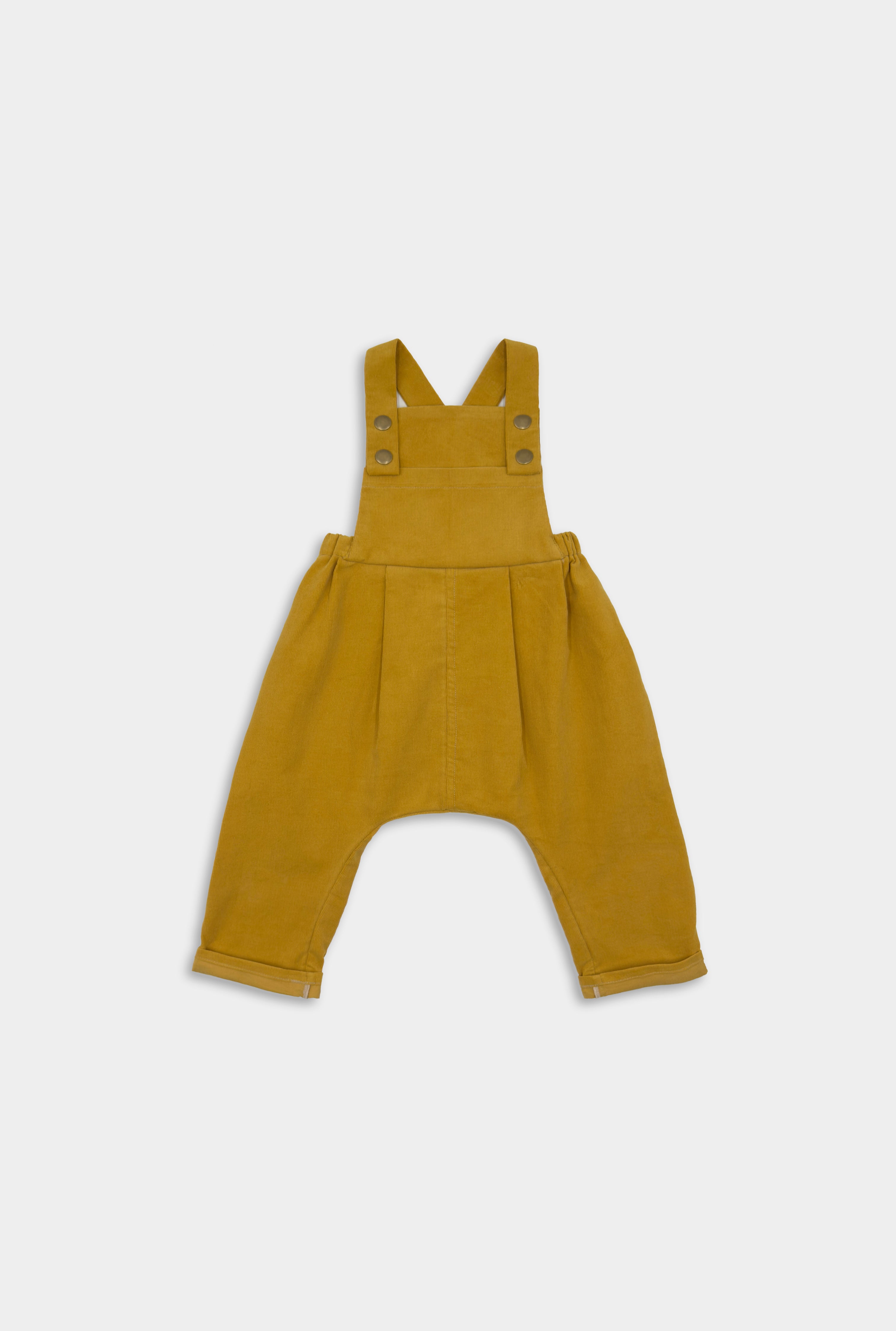 Front view of the Ginger Corduroy Long Overalls showcasing the warm color and detailed stitching, pleats, generous bib and rolled leg cuffs for growth.