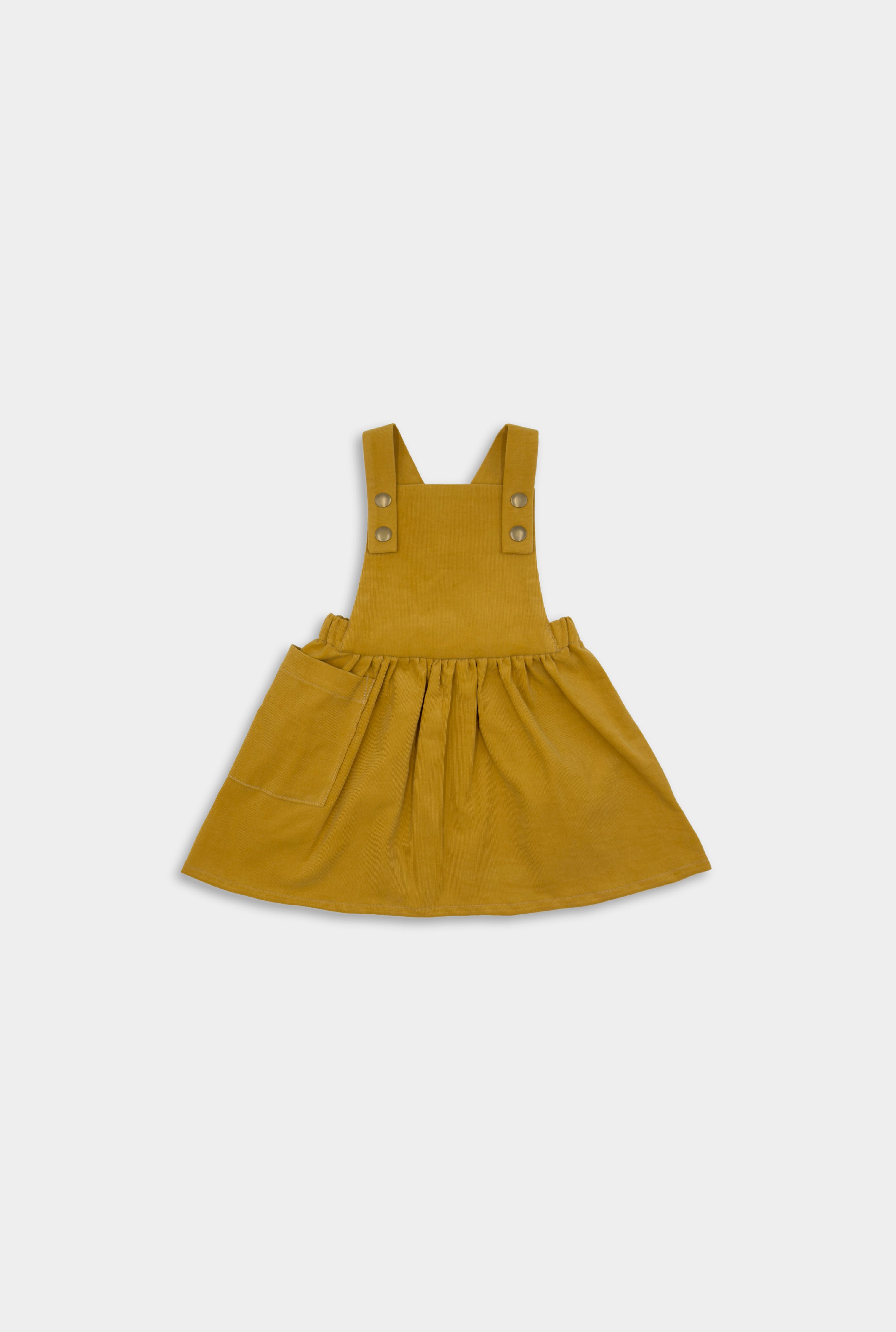 Front view of the Mustard Pinafore, a classic and timeless design made from repurposed 100% soft corduroy, showcasing its stylish and eco-friendly appeal for little girls.