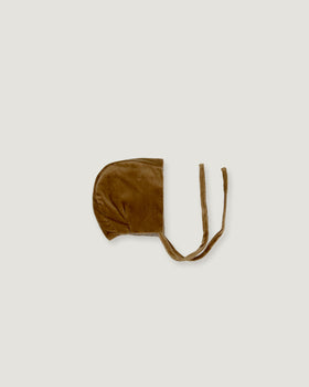 A golden velvet bonnet for children
