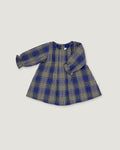 A long-sleeve children's dress with a blue, beige, and white plaid pattern, laid flat on a light gray background.