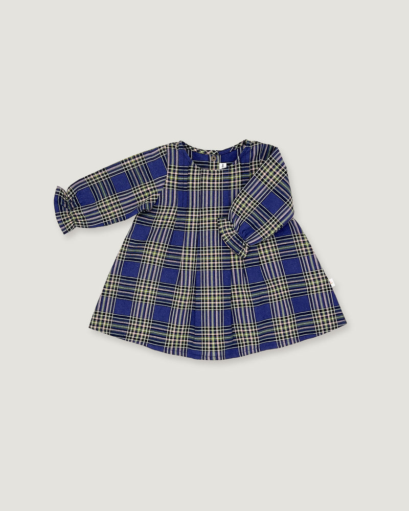 A long-sleeve children's dress with a blue, beige, and white plaid pattern, laid flat on a light gray background.
