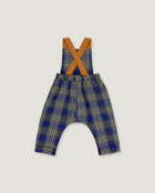 A baby romper with suspenders featuring a blue, beige, and white plaid pattern, with contrasting tan shoulder straps, shown on a light gray background.