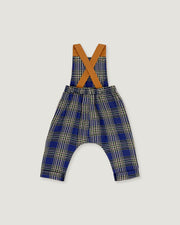A baby romper with suspenders featuring a blue, beige, and white plaid pattern, with contrasting tan shoulder straps, shown on a light gray background.