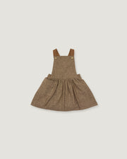 A toddler girl's brown tweed overall dress with adjustable shoulder straps and a gathered skirt, shown flat on a light gray background.
