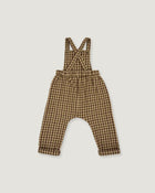 A baby romper with suspenders in a brown and beige gingham check pattern, laid flat on a light gray background.