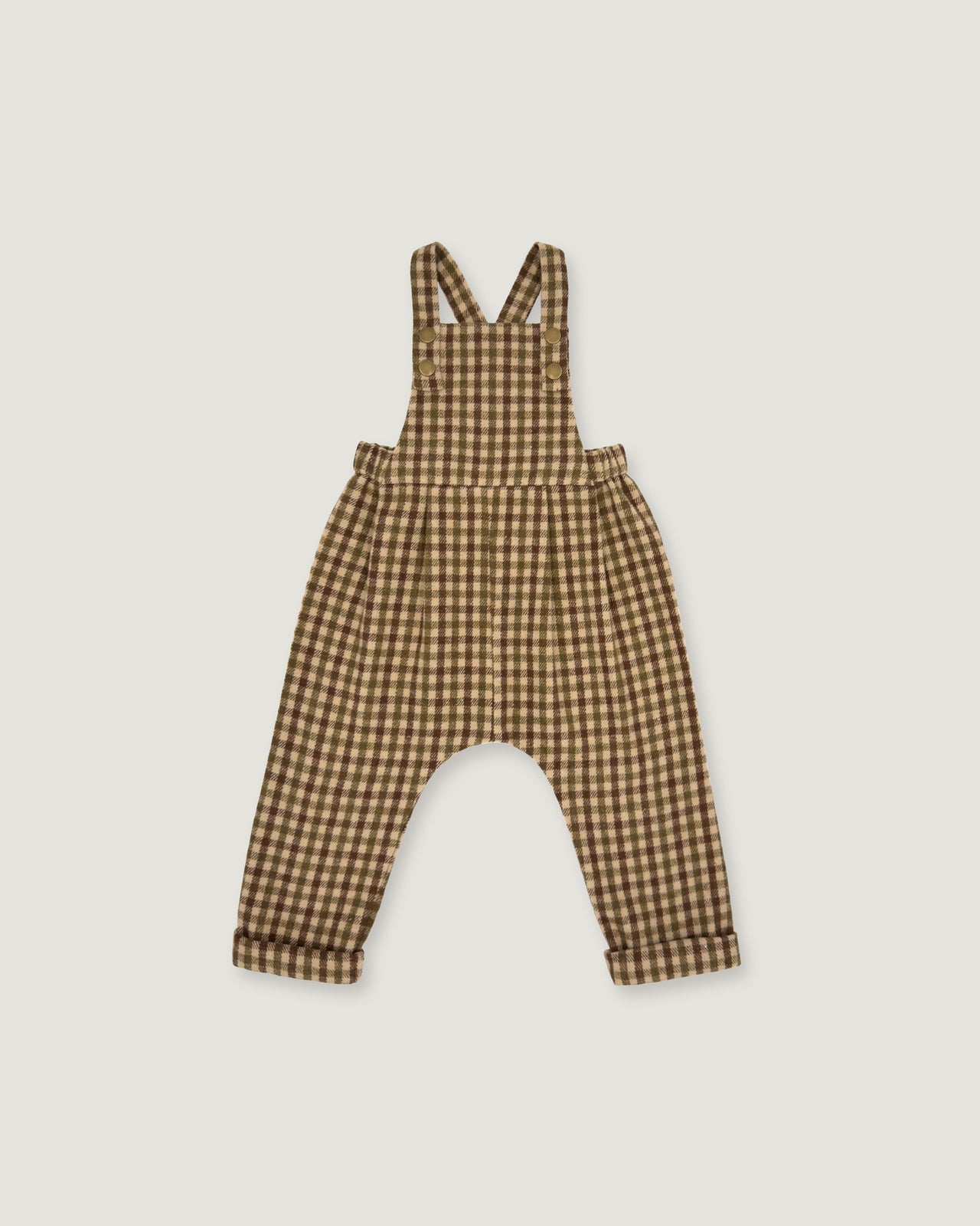 A baby romper with brown and beige gingham check print, featuring shoulder straps and a wide leg design, shown flat on a light gray background.