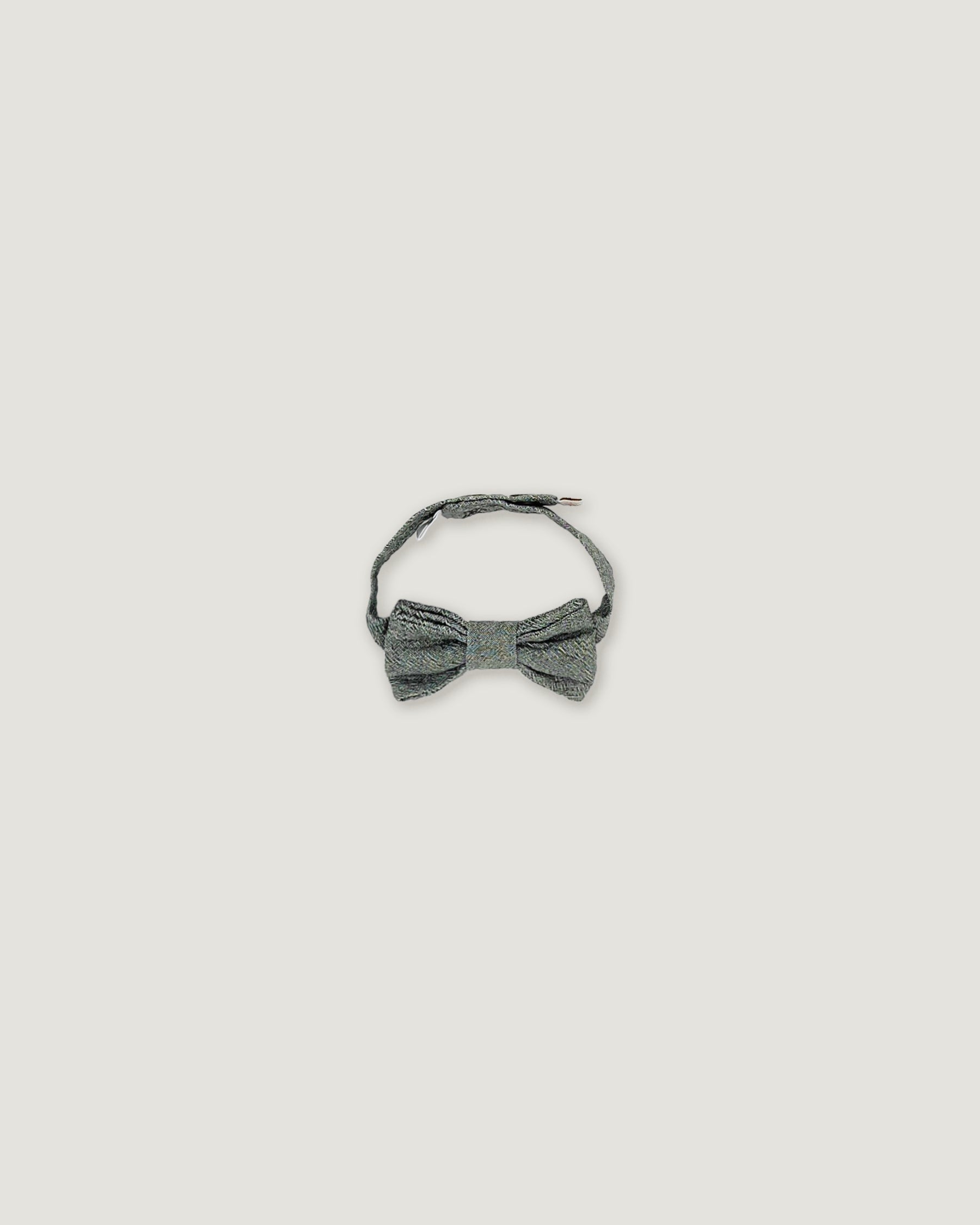 Bow tie for boys in olive green linen on a white background