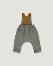 A pair of baby boy's heather gray linen suspenders with contrasting orange-brown leather straps, shown flat on a light gray background.