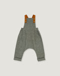 A pair of baby overall pants in heather gray wool, featuring brown leather shoulder straps with snap buttons, shown flat on a light gray background.
