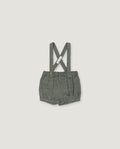 A pair of toddler's gray woven linen suspender shorts with a pleated front and adjustable shoulder straps, shown flat on a light gray background.