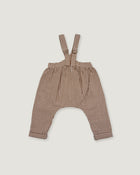 Brown and beige gingham patterned baby overalls with shoulder straps, laid flat on a light gray background.