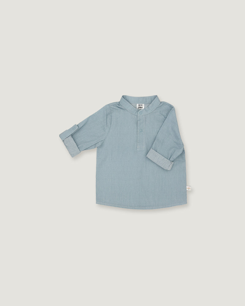 A light blue long-sleeve shirt for toddlers, featuring a polo-style collar and a short button placket, laid flat against a neutral light gray background.