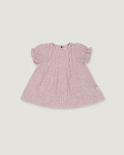 A pink and white micro-check patterned baby dress with short puff sleeves, shown flat on a light gray background.