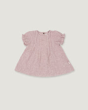 A pink and white micro-check patterned baby dress with short puff sleeves, shown flat on a light gray background.
