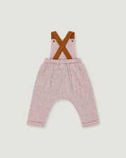A baby romper with pink and white micro-check patterned pants, brown suspenders, and an elastic waistband, shown flat on a light gray background.