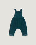 A pair of toddler corduroy overall jumpsuit in a deep teal blue-green color, featuring adjustable shoulder straps that cross over the chest and cuffed harem-style legs, shown flat on a light gray background.