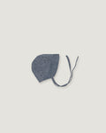 Blue linen bonnet for children with a visor  on a white background