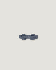 Bow tie in a denim blue linen for boys on a white background