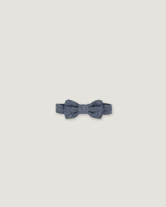 Bow tie in a denim blue linen for boys on a white background