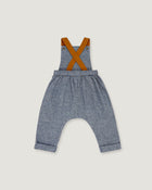 A pair of baby boy's heathered blue-gray denim overall pants with brown suspenders, shown flat on a light gray background.