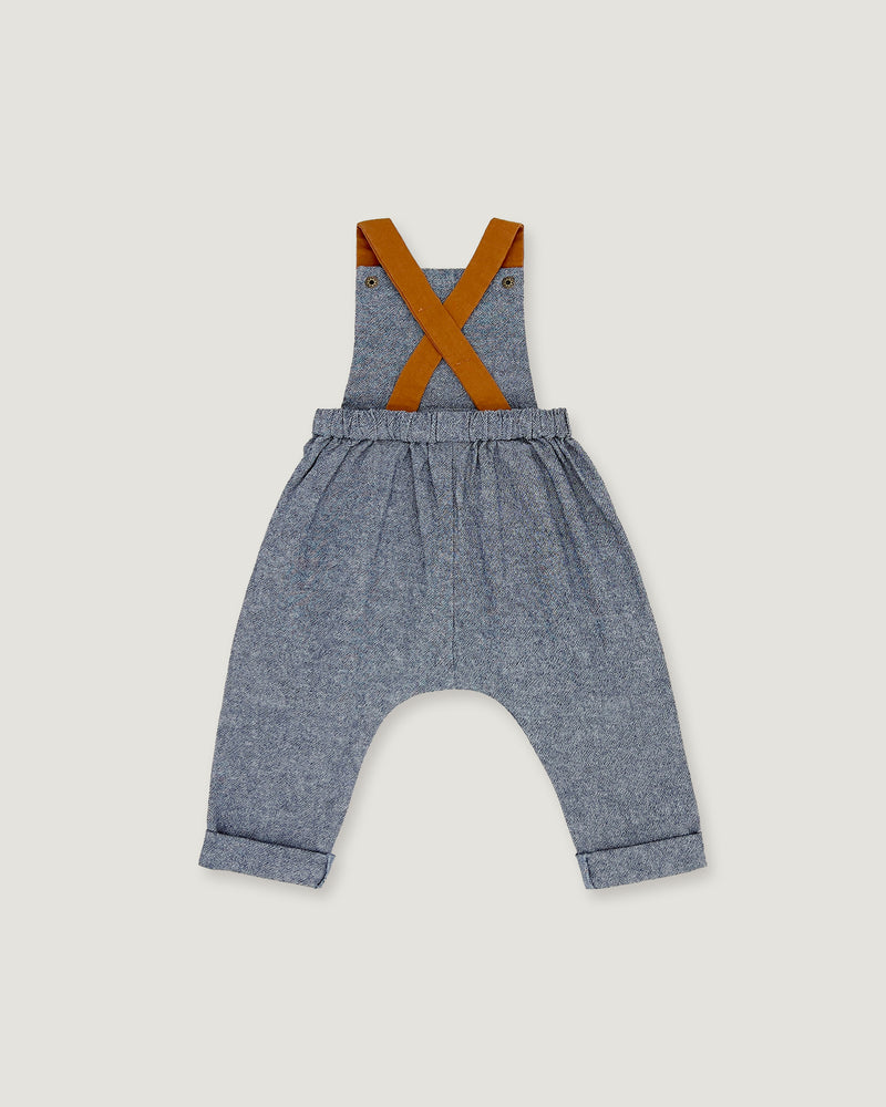 A pair of baby boy's heathered blue-gray denim overall pants with brown suspenders, shown flat on a light gray background.